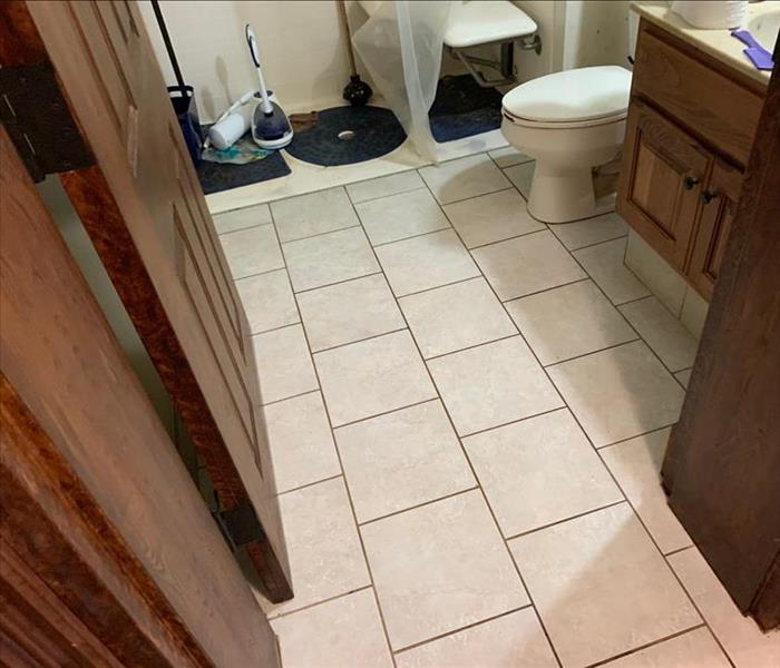 The same bathroom is completely clean